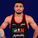 ابوالفضل مهمدی پس از کسب مدال طلای کشتی فرنگی زیر ۲۳ سال جهان در آمریکا